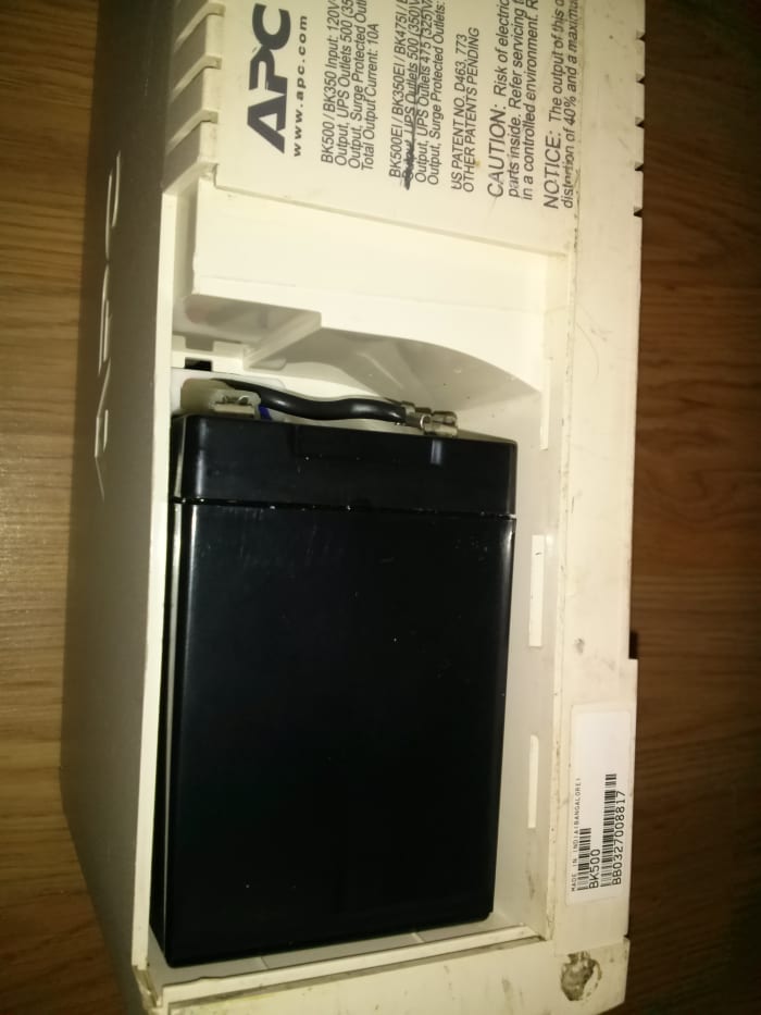 View from above with the battery installed before re-inserting the cover panel and placing the unit right-side up.