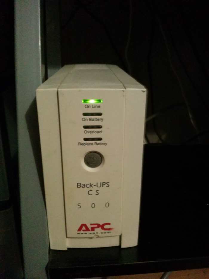 Back-UPS unit plugged in with a good battery, quietly charging. Hooray for no more alarm squeals!