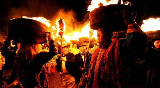 Allendale in Northumberland, sees a procession of flaming barrels of tar paraded through the streets to drive the evil spirits away. They are then thrown onto a bonfire.