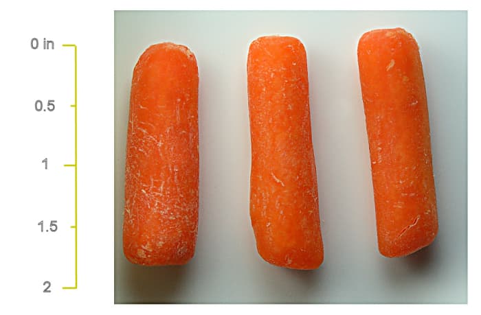 Producers of baby carrots cut them into convenient snack-size pieces.