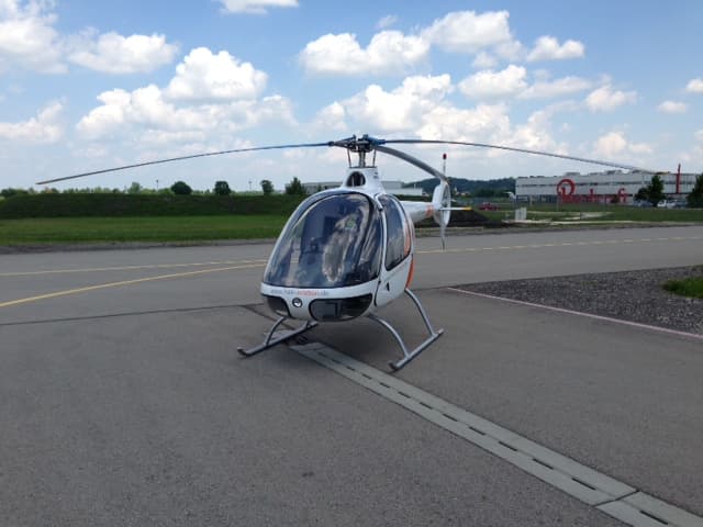 Cabri G2 Helicopter standing on the apron at Augsburg airport (EDMA) in Germany