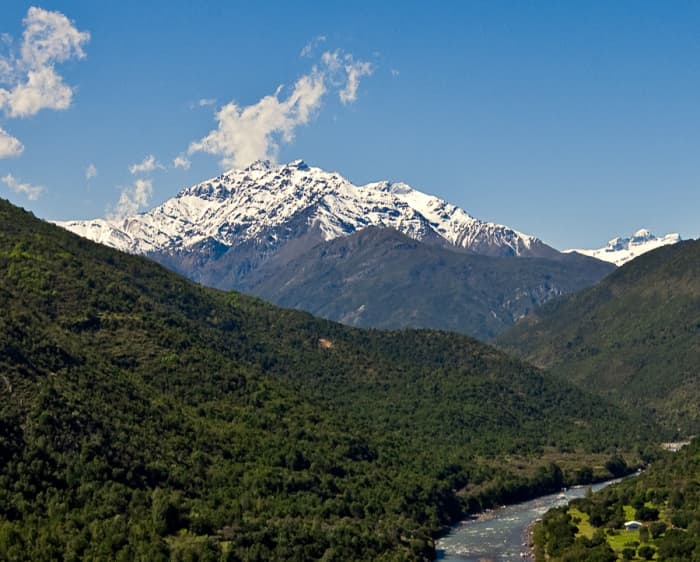 The present-day Tinguiririca River Valley. The volcano is the background stands over 14,000 feet high.
