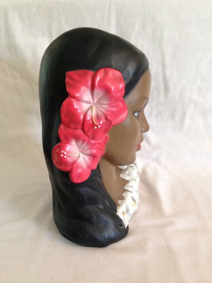 It was at Lego of Japan that a new generation of ceramic artists studied new and traditional glazing forms and techniques to preserve and create a new age of native wares and marketable art forms such as this Hawaiian girl head bust.