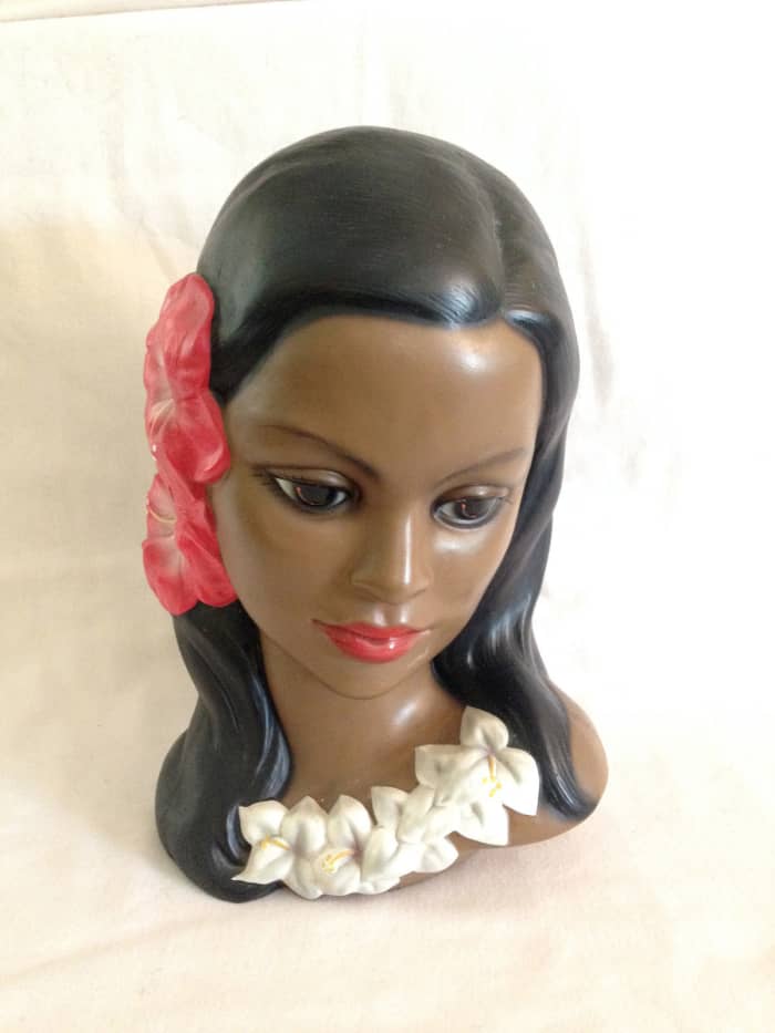 This great vintage from the 1950s Hawaiian or Polynesian girl head bust with hibiscus lei is a cultural classic. Made by Lego of Japan and remarkable well done. It is a must for any Tiki or Polynesian culture collection.