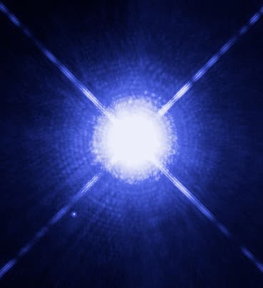 Sirius A is in the Canis Major constellation and is called The Great Dog. Sirius B, the white dwarf is referred to as The Pup, which shows as a tiny white dot, lower left.