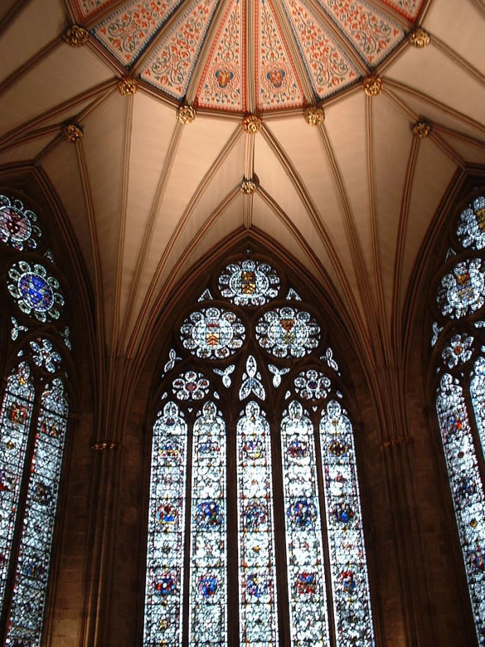 Windows in the Chapter House at York Minster show the equilateral arch with typical circular motifs in the tracery.