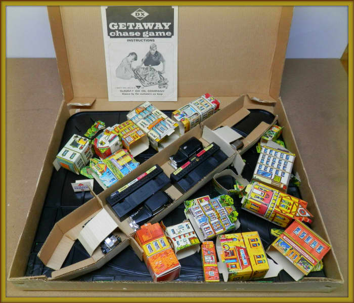 Here it is all in one box the amazing 1960's Getaway Chase Game DX Sunray Oil Company. I dream adventure waiting to be un-boxed ...