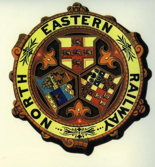 Further in time, the North Eastern Railway arms depicts York again at the top, Leeds on the left and Newcastle right