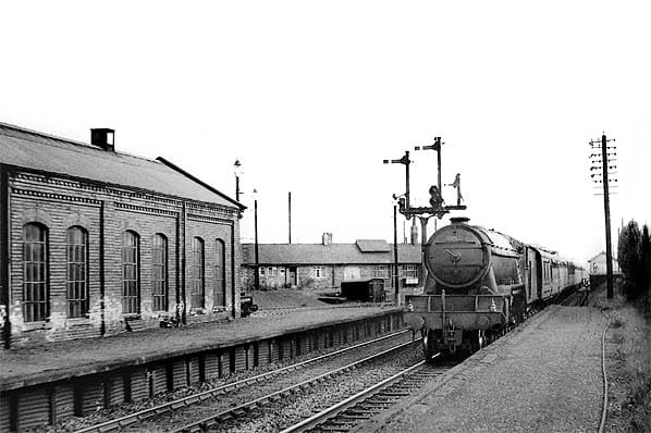 Looking the other way, with Class A3 Pacific heading a passenger working towards Leeds via Ripon and Harrogate past the locomotive depot