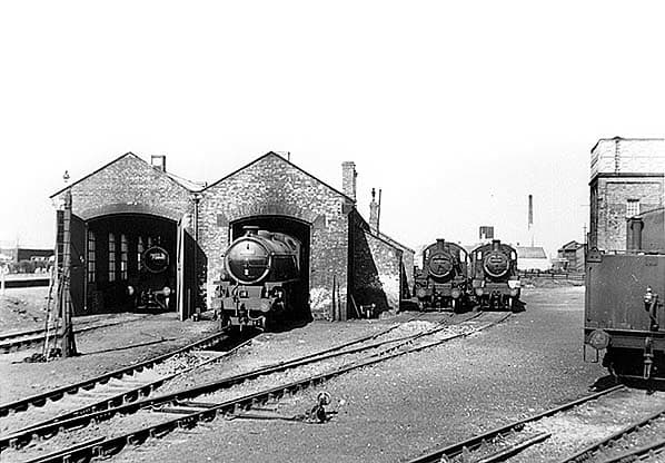 Northallerton's motive power depot in 1958 seen from the north. The depot was squeezed between the low level lines and the higher East Coast Main Line, visible from the back of the Down platform