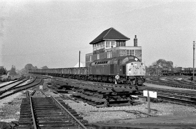 Rationalisation of the junction in 1970 - English Electric D252 passes Northallerton's signal box southbound with a train of BR 16 ton mineral wagons. There's something essentially British about the design of these two diesel locomotives... unlike...