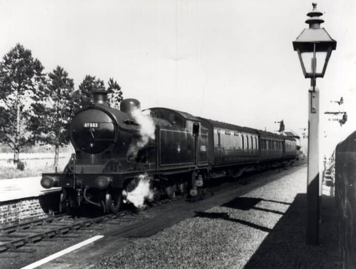 Battersby - Class A8 4-6-2 tank loco 69885 of Scarborough runs into the station with a mixed train of non-corridor passenger stock. The engine will have to run round her train before taking her out either north to Middlesbrough or east for Whitby