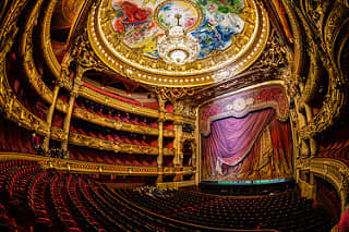 The marvelous stage of the Opera Garneir. The elegant seats have allowed spectators to enjoy the performances for over a hundred years.