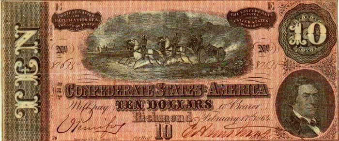A $10.00 Confederate States of America Currency. With a team of horses pulling cannon in the center, and R.M.T. Hunter to the right. This is the fifty series. With a lot of hand drawn workmanship.