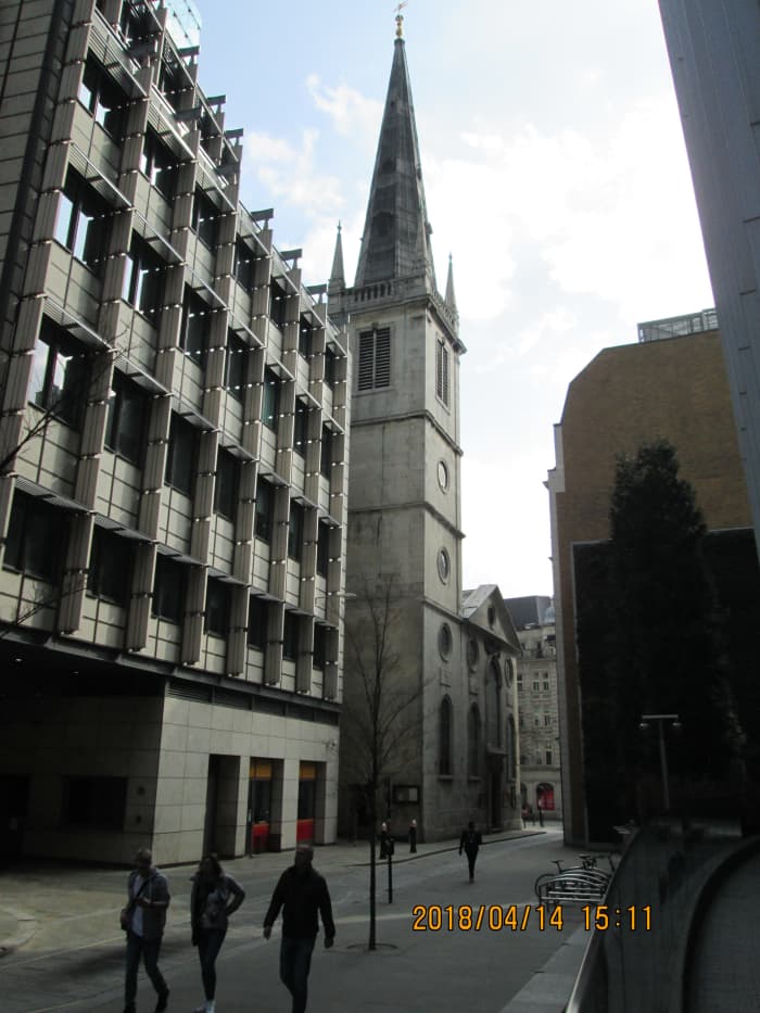 Between office blocks and shops is the church of St Margaret Patten. You see the tower at an oblique angle before the rest of the building comes into view...