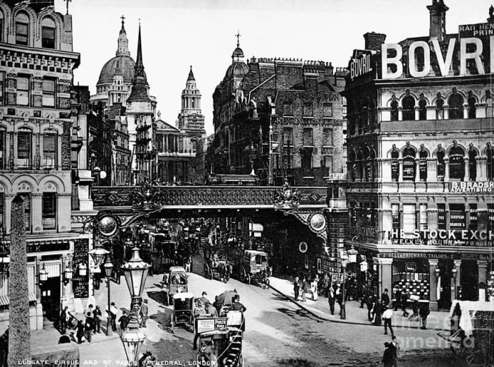 From around the same place, St Paul's nestles behind office buildings and shops at the top of Ludgate Hill where old St Paul's stood until 1666. The railway bridge in Granger's pre-WWI photo took the line from Blackfriars to Holborn Viaduct Station