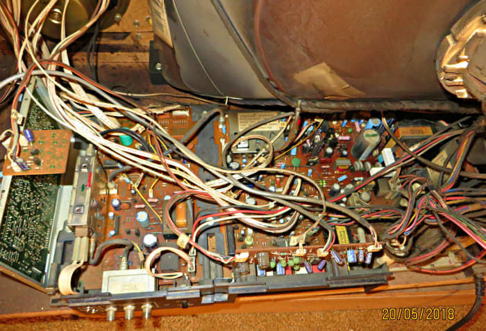 The 1985 Curtis Mathes Color Console, Model K2658RL, with the amazing made in America A66AbU30X CRT picture tube. The integrated circuit boards to keep this CRT bright & beautiful since 1985 are amazing.