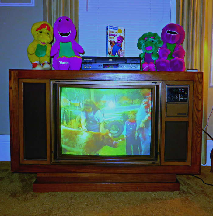 The 1985 Curtis Mathes Color Console Playing a Barney Home Video VHS tape from a Curtis Mathes VCR tape player in the year 2018, vintage fun for the whole family to enjoy over and over again.