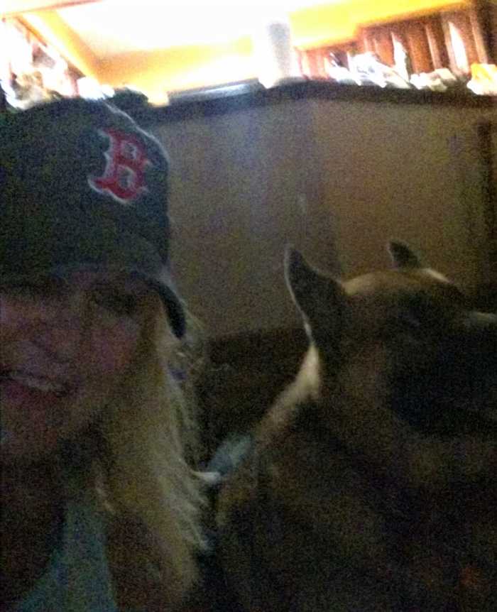 My dog is mad at me because these late night games keep US up til the wee hours of the morning. He is so dramatic; yawning, whimpering, grumbling, whining.....LOL He even looked away when I tried to take our picture....Sorry Gunner! Go Red Sox!!!