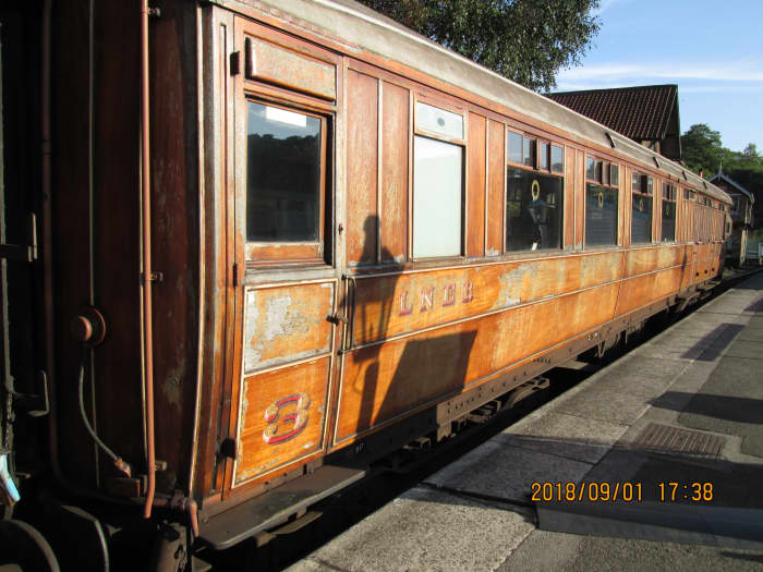One of the LNER Coach Association's teak finished Gresley carriages stands on the back road near the signal cabin - looks like it needs a bit of TLC (some were vandalised at Pickering recently)