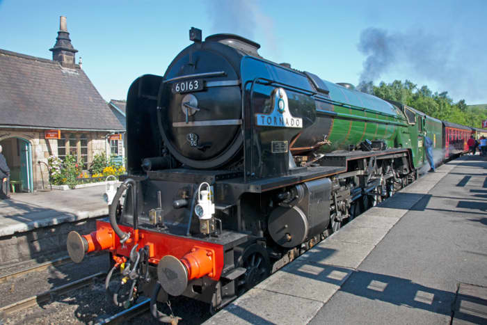 On a sunny March day, 2018 Peppercorn A1 60163 'Tornado' simmers on the 'up' platform at Grosmont with a train for Pickering