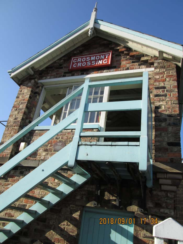 From the pedestrian crossing gate at Grosmont, the stairs to the signal cabin operating floor and an open door for ventilation on a warm day