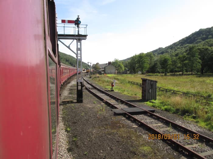 ... Goes to the signalling and telegraph department on the NYMR - here we pass the late LNER bracket-mounted advance starter at Levisham, the right-hand arm for any locomotives that might await the off from the siding on the right.