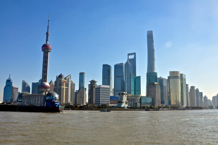 A view of the Shanghai Central Business District/Pudong District from the west side of the Pudong River. British concession buildings are directly behind.