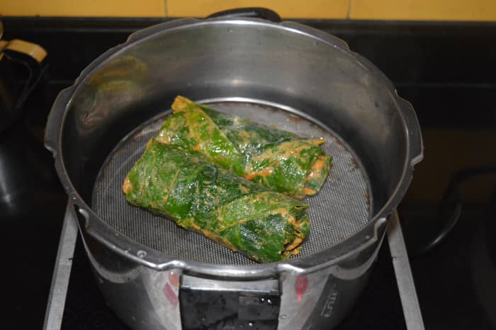 Step four: Cook the rolls by steaming for 20 minutes. I used a pressure cooker for this purpose. Don't put the cooker weight. Half-way through, turn taro rolls for uniform cooking.
