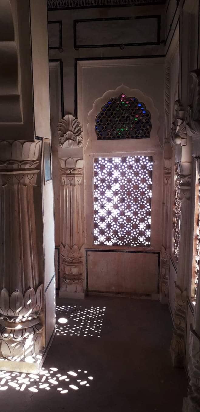 The Jharokha or the window, from where the queen used to see the proceedings of the Royal court rooms. Since those were the times, when there was purdah system.
