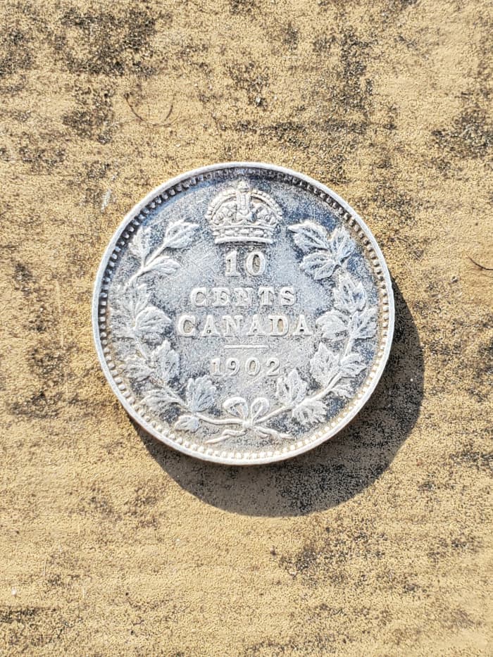 I found this 10 cent Canadian silver coin in the same field where I found the Japanese 1/2 Sen. The coin is dated 1902.