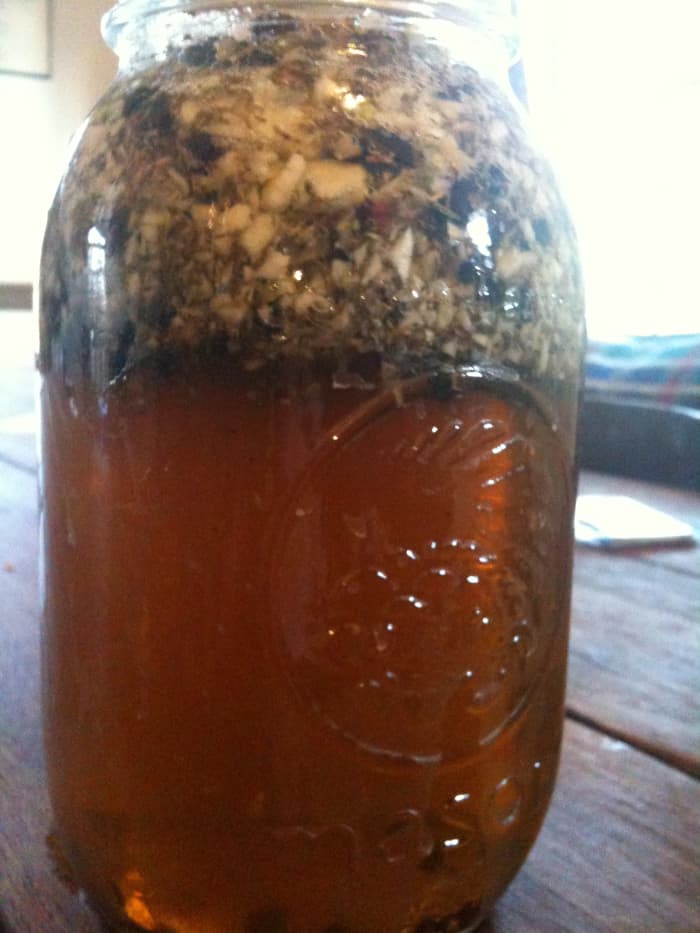 Stick your brine ingredients in glass or plastic container and steep them for an hour or so - just like tea.