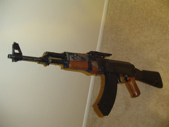 This is my Cyma CM.028 airsoft electric gun after 3 years of play. It is very beat up, but still works great!