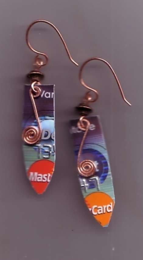 Stop. Don't pull out that credit card. If you need a little help keeping your spending habits in line, cut your credit or debit card into strips, add holes, a bit of trim and a pair of earwires, and dangle them from your ears.