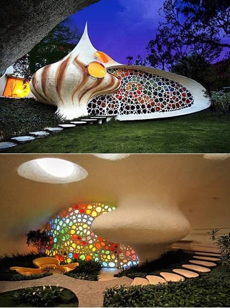 this is actually pretty, situated in Mexico, The Nautilus House, is a seashell-inspired abode built by designed by Senosiain Arquitectos for a couple. I don't know how practical it would be with all my kids and pets though...