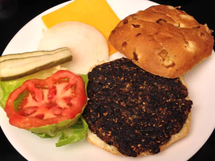 Burger patty made from chopped mushrooms. Shown with the "usual suspects": lettuce, tomato, onion, pickles, and cheese.