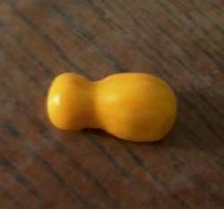 Step 3. Smooth the pinched area with greased fingers until it is shaped like the gourd or squash of your choice.