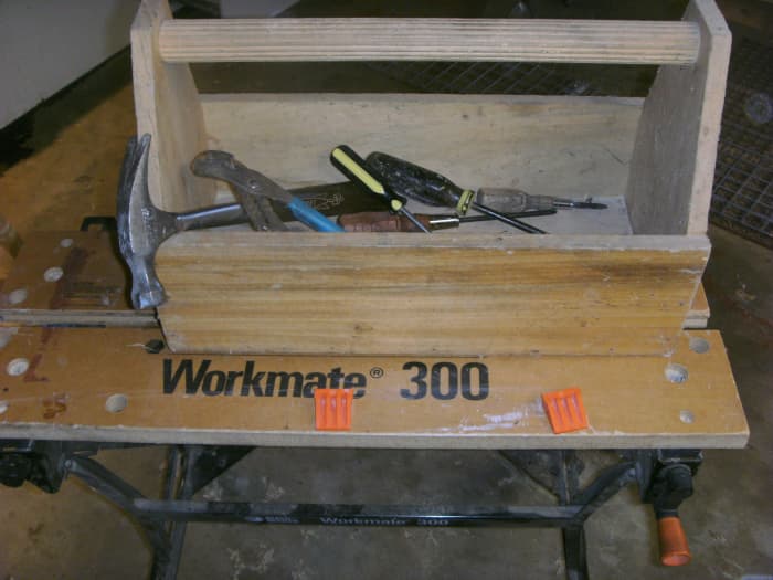 Toolbox made by cub scouts and used for 30 years. Note the Workmate workbench it is sitting on.