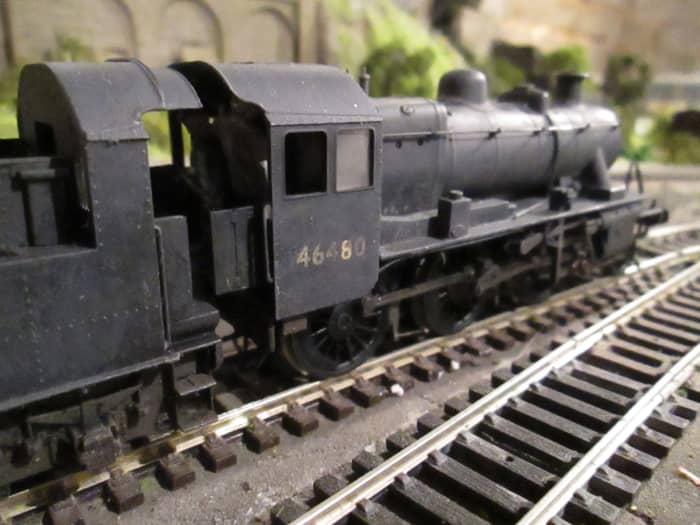 Ex-LMS 2MT 2-6-0, class nicknamed 'Mickey Mouse' ran on branch lines with light goods, occasional passenger workings - a weathered Bachmann model with lost wax cast vacuum pipes and Jackson screw couplings. Hand-painted white-metal crew
