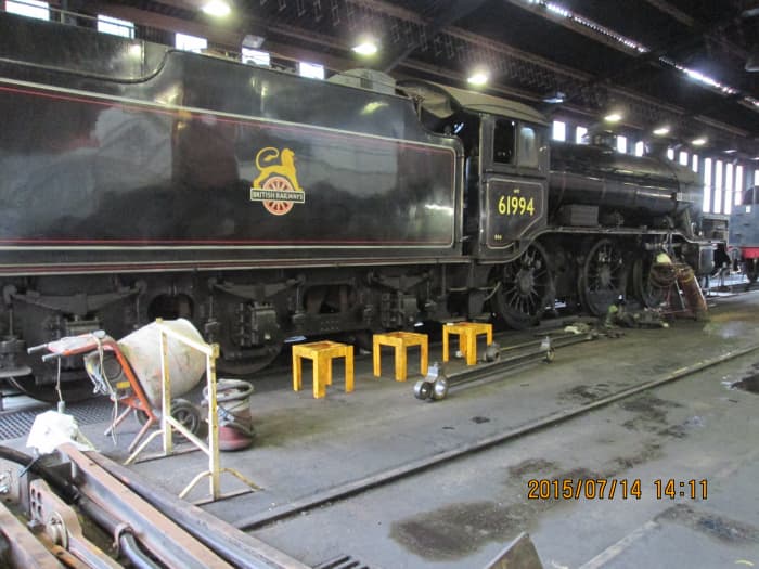 The real thing, one-time 3442 'The Great Marquess', now in BR guise as 61994 with early BR lion on wheel crest under ownership of James Cameron, in NYMR Grosmont shed