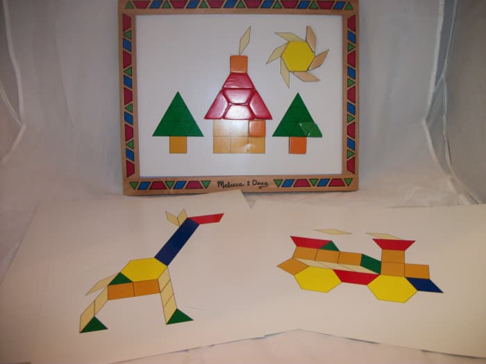 Melissa & Doug pattern block are magnatized and stay in place. Comes with picture plates to copy.