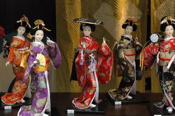 From humble materials, the face and body parts are built up by exacting craftsmen into the final product, dressed and charmingly displayed.