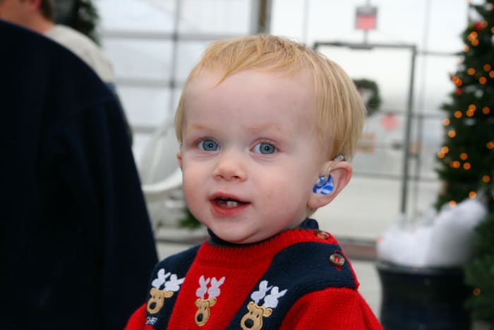 Hearing aids are necessary for a child's development of spoken language: unfortunately, most insurance companies consider this medical device a "lifestyle choice" and refuse to provide coverage. Families must seek funding from charities in the USA.