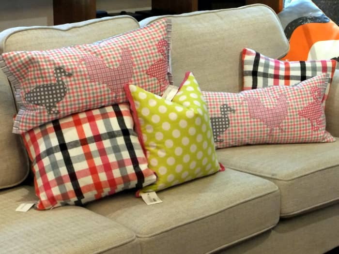 4. Throw pillows in cotton fabrics are durable and easy to maintain, ideal for the family room.