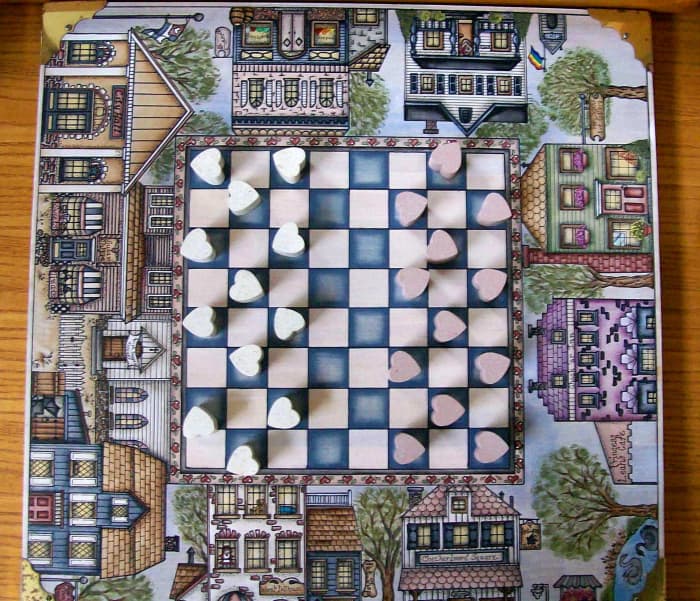Another beautiful checker board with heart shaped movable pieces painted by Patty Sypek