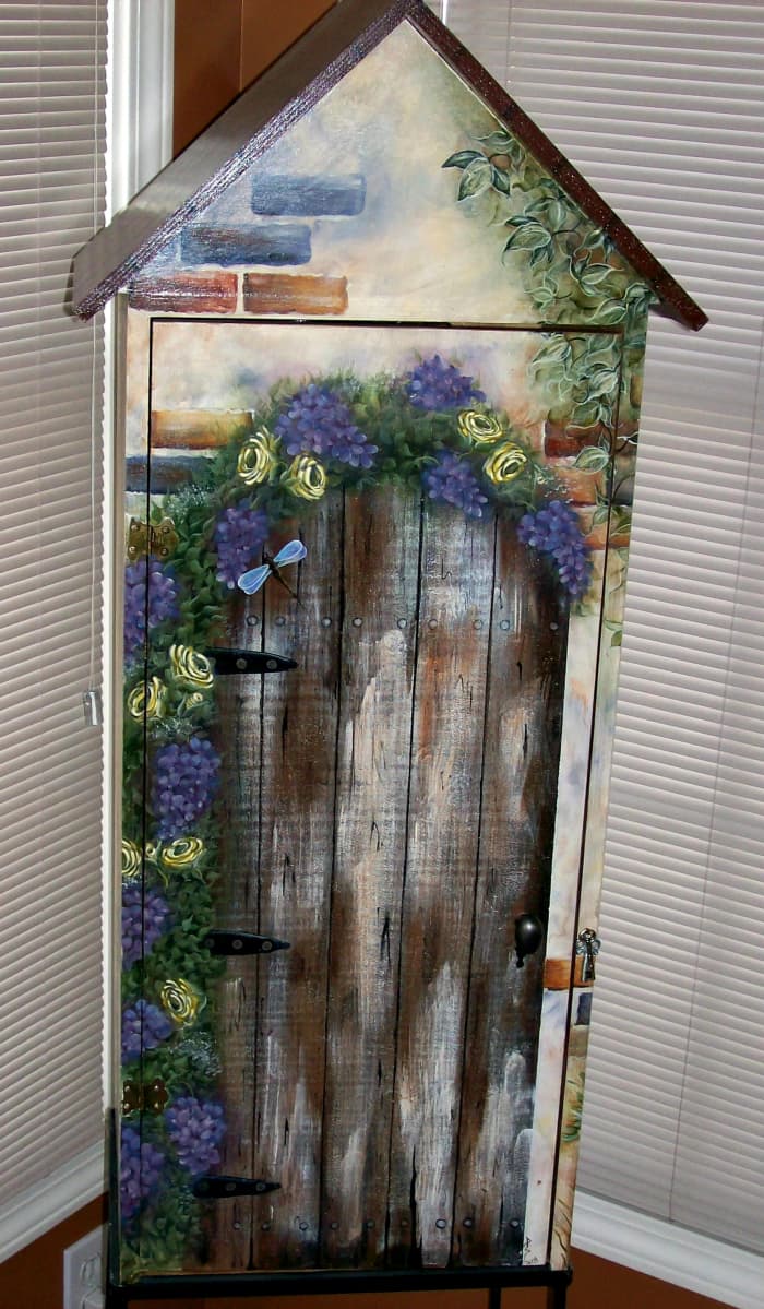 Decorative art storage cabinet painted by Patty Sypek/design by Fiona Hayward