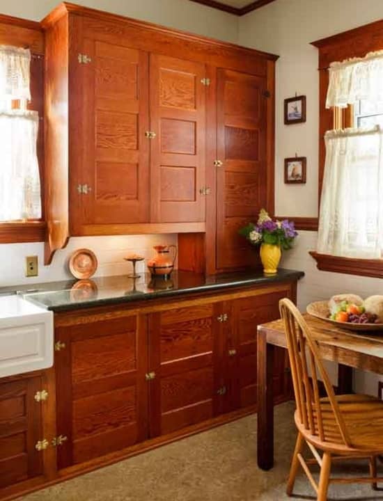 Absolutely flawless original vintage cabinets. Note the lack of toe space...continuous crown trim from cabinets to window, correct hinges and latches. These are original, never painted, cabinets.