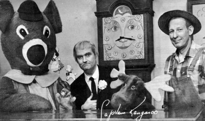 Dancing Bear, Bunny Rabbit, the Captain, Mr. Moose, Mr. Green Jeans, and Grandfather Clock in the background.