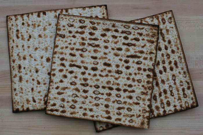 Unleavened bread pierced and striped, depicting the wounds of Christ's body and His sufferings for our sins.