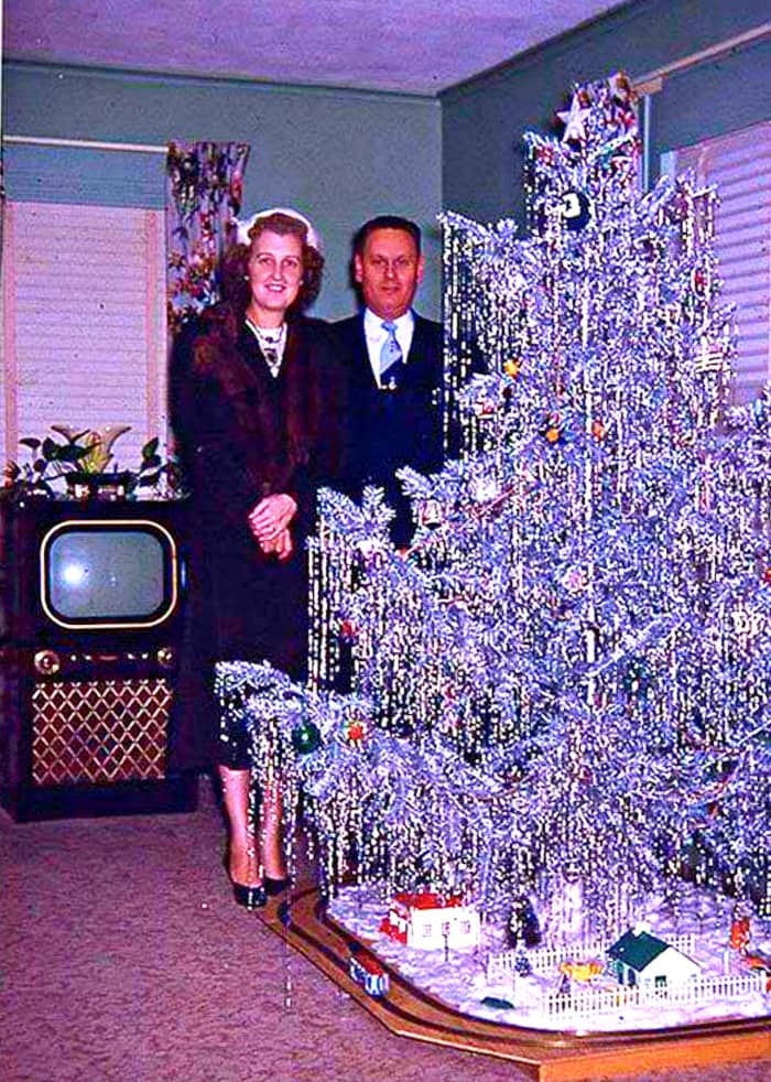 Have a bit of tinsel baby, the first Aluminum Christmas Tree in 1959, count down to the 1960s space age just began, things are starting to change.